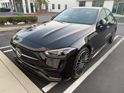 Black Mercedes-Benz C300, front three-quarter view