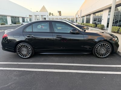 Black Mercedes-Benz C300, full side profile