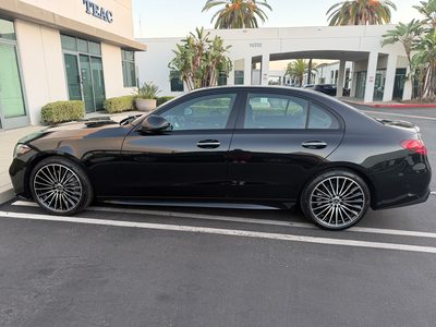 Black Mercedes-Benz C300, opposite side profile
